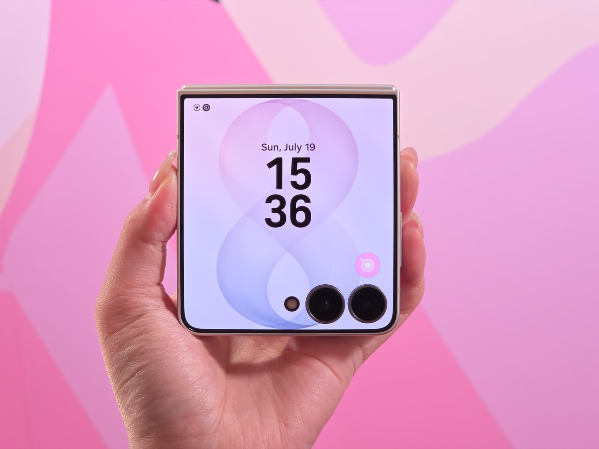 Closed Galaxy Z Flip8 in hand showing the 4.1-inch FlexWindow