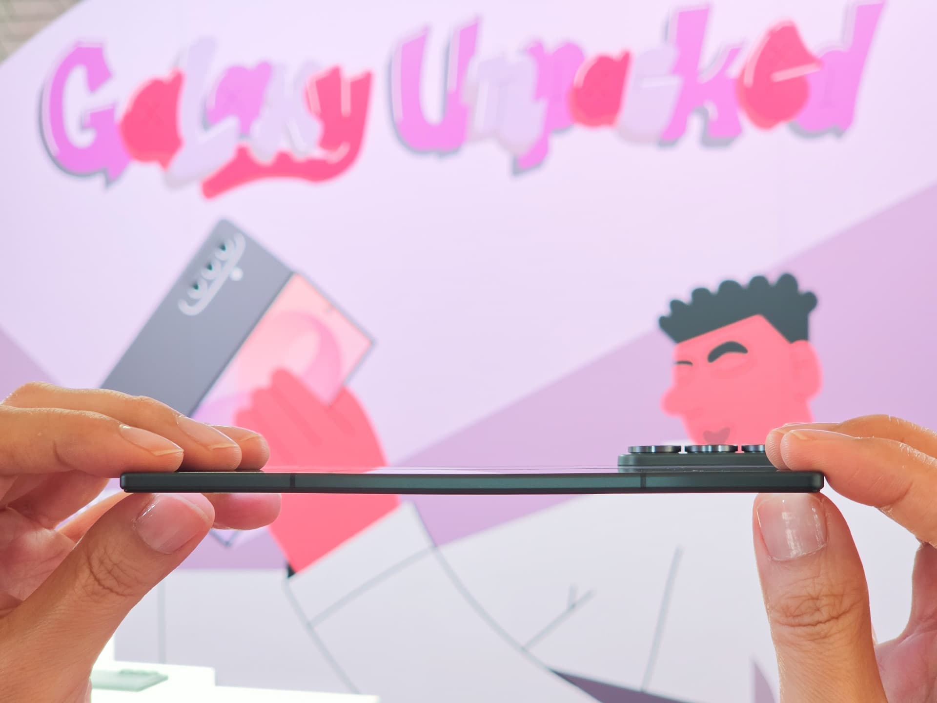 Folded Galaxy Z Fold8 Ultra held side-on, showing the slim profile